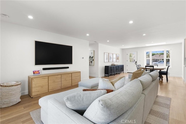 2343 E Athens Ave, Orange, CA 92867 - living room featuring baseboards, recessed lighting, and light wood-style flooring