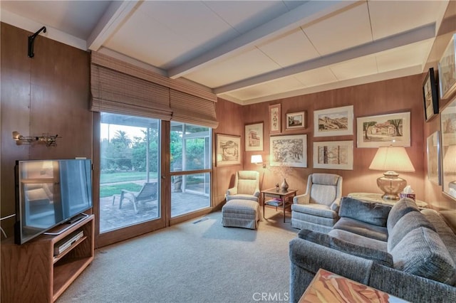 5646 E Park Circle Dr, Fresno, CA 93727 - carpeted living room with beam ceiling and wooden walls