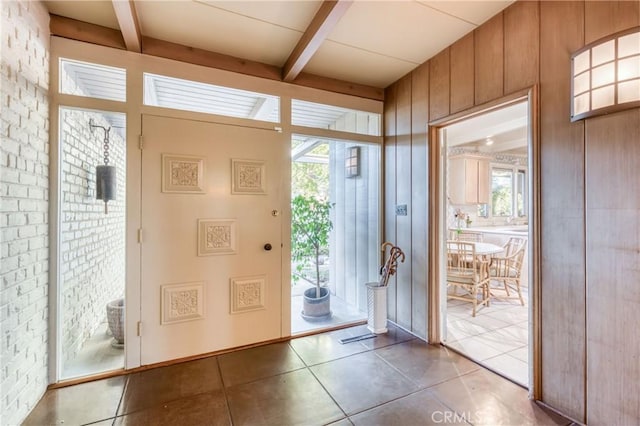 5646 E Park Circle Dr, Fresno, CA 93727 - foyer entrance featuring beam ceiling and tile patterned floors