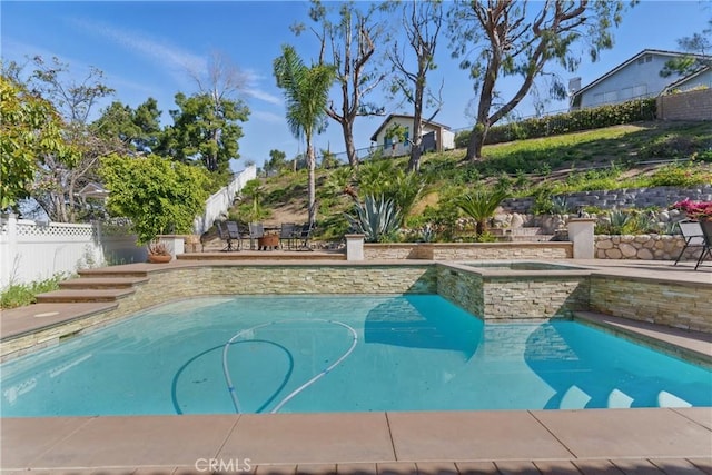 3381 Deaver Dr, Corona, CA 92882 - pool with a fenced backyard and an in ground hot tub