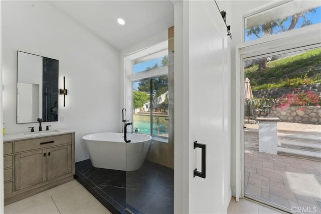 3381 Deaver Dr, Corona, CA 92882 - full bathroom featuring a freestanding bath and vanity