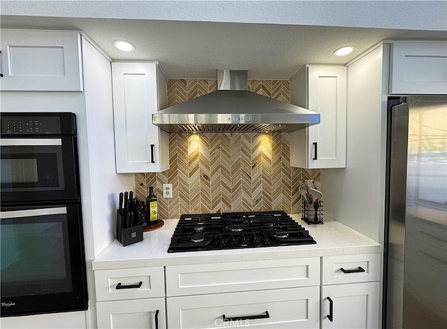 3381 Deaver Dr, Corona, CA 92882 - kitchen featuring white cabinets, light countertops, black appliances, and wall chimney range hood