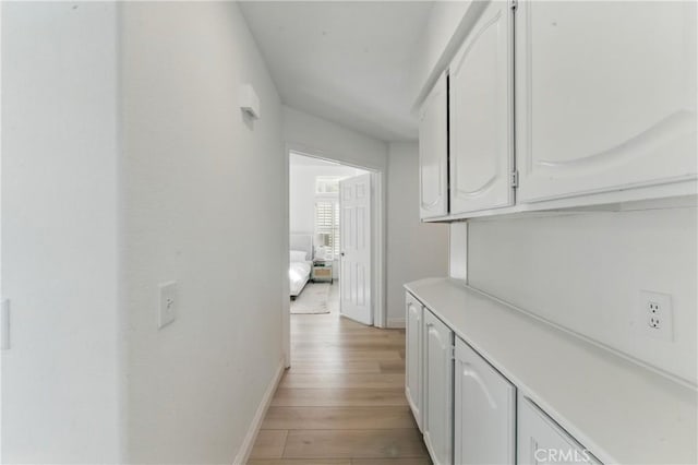 3381 Deaver Dr, Corona, CA 92882 - hall featuring light wood-type flooring and baseboards