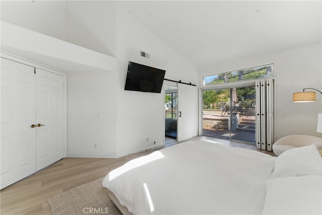 3381 Deaver Dr, Corona, CA 92882 - bedroom featuring high vaulted ceiling, light wood finished floors, baseboards, access to outside, and visible vents