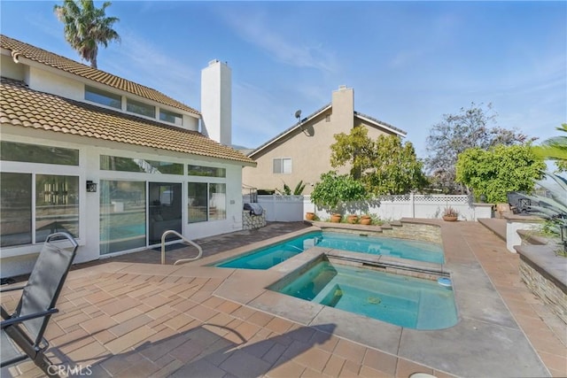 3381 Deaver Dr, Corona, CA 92882 - view of pool featuring a fenced backyard, a patio, a fenced in pool, and an in ground hot tub