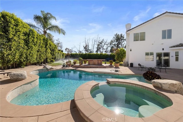 11310 Wentworth St, Sun Valley, CA 91352 - view of swimming pool with a pool with connected hot tub and a patio