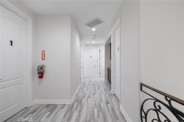11310 Wentworth St, Sun Valley, CA 91352 - hallway featuring light wood-type flooring, baseboards, visible vents, and recessed lighting