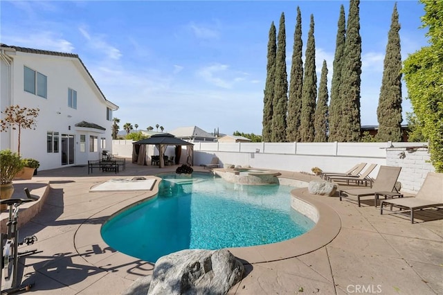 11310 Wentworth St, Sun Valley, CA 91352 - view of pool with a gazebo, a patio area, a pool with connected hot tub, and a fenced backyard