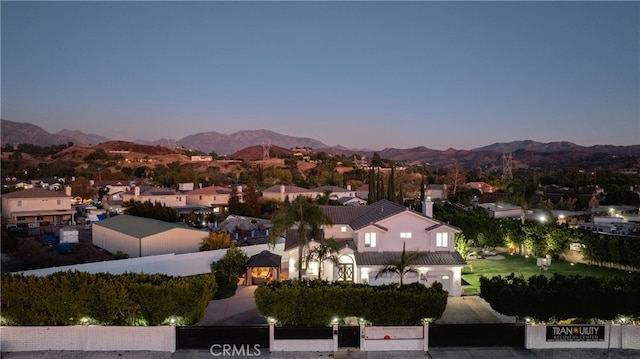 11310 Wentworth St, Sun Valley, CA 91352 - aerial view at dusk with a mountain view