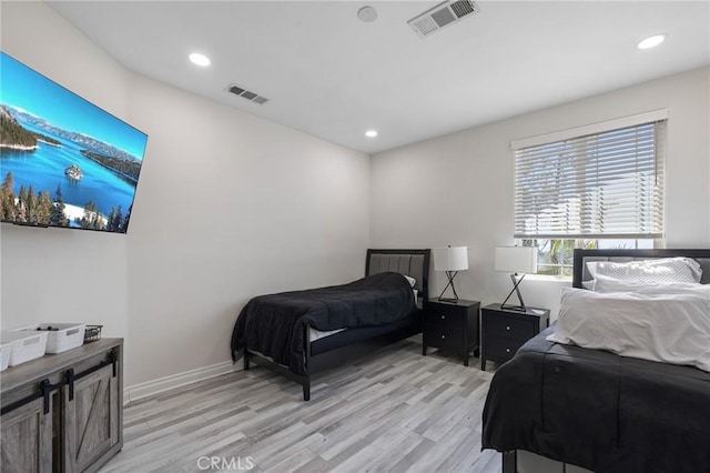 11310 Wentworth St, Sun Valley, CA 91352 - bedroom with baseboards, recessed lighting, visible vents, and light wood-type flooring