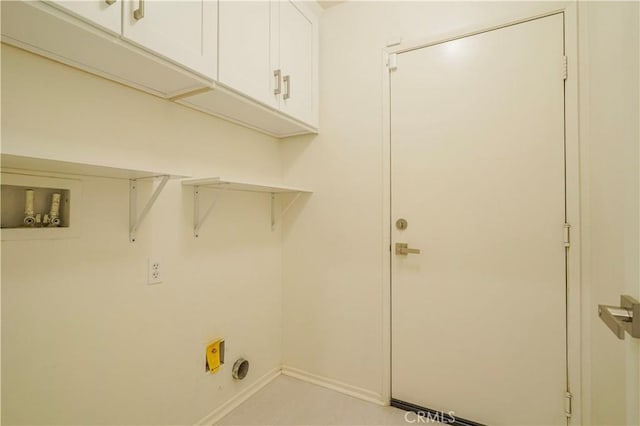 15255 Sunny Point St, Victorville, CA 92394 - laundry area featuring cabinet space, washer hookup, and baseboards