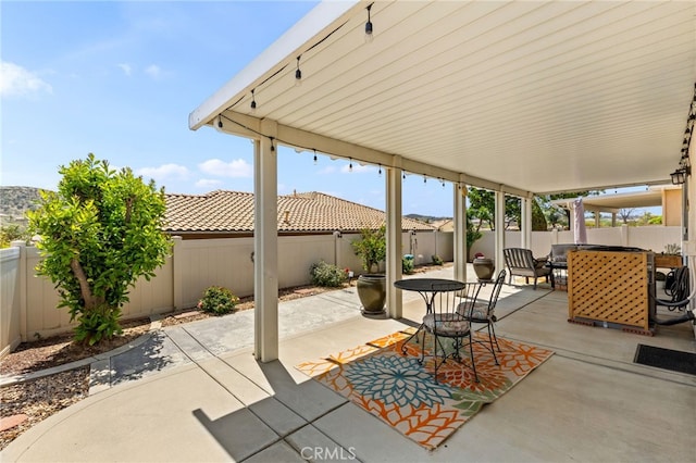 6112 Turnberry Dr, Banning, CA 92220 - view of patio / terrace with a fenced backyard and outdoor dining space