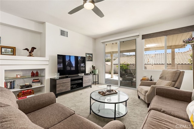 6112 Turnberry Dr, Banning, CA 92220 - carpeted living area featuring ceiling fan and visible vents