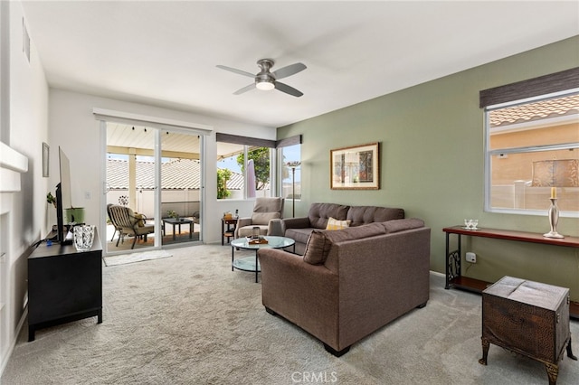 6112 Turnberry Dr, Banning, CA 92220 - carpeted living room with ceiling fan and visible vents