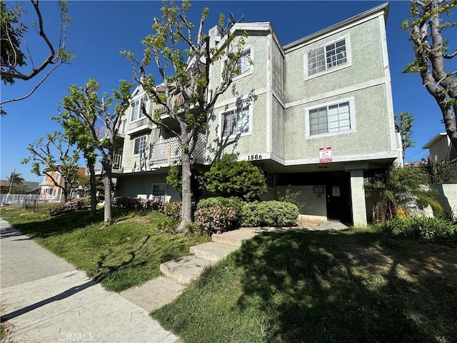1566 Pine Ave Unit 206A, Long Beach, CA 90813 - view of front facade featuring stucco siding