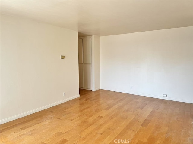 1566 Pine Ave Unit 206A, Long Beach, CA 90813 - empty room with light wood-style floors and baseboards