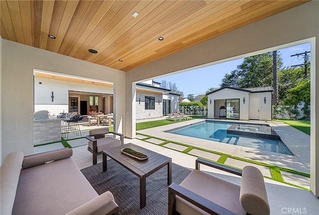 view of pool with an outdoor structure, an outdoor hangout area, a pool with connected hot tub, and a patio