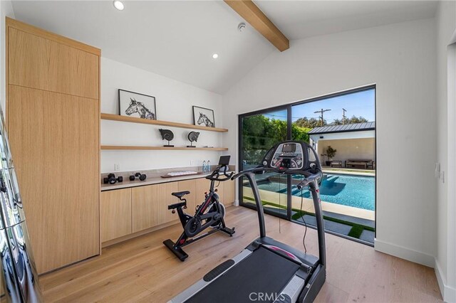 workout area featuring light wood-style flooring, baseboards, recessed lighting, and vaulted ceiling