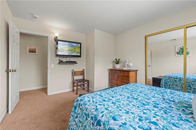bedroom featuring carpet floors, baseboards, and visible vents