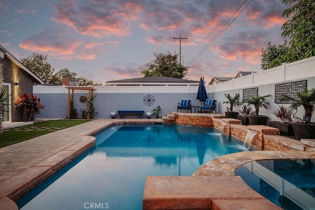 view of pool with a fenced in pool, a fenced backyard, and a patio area