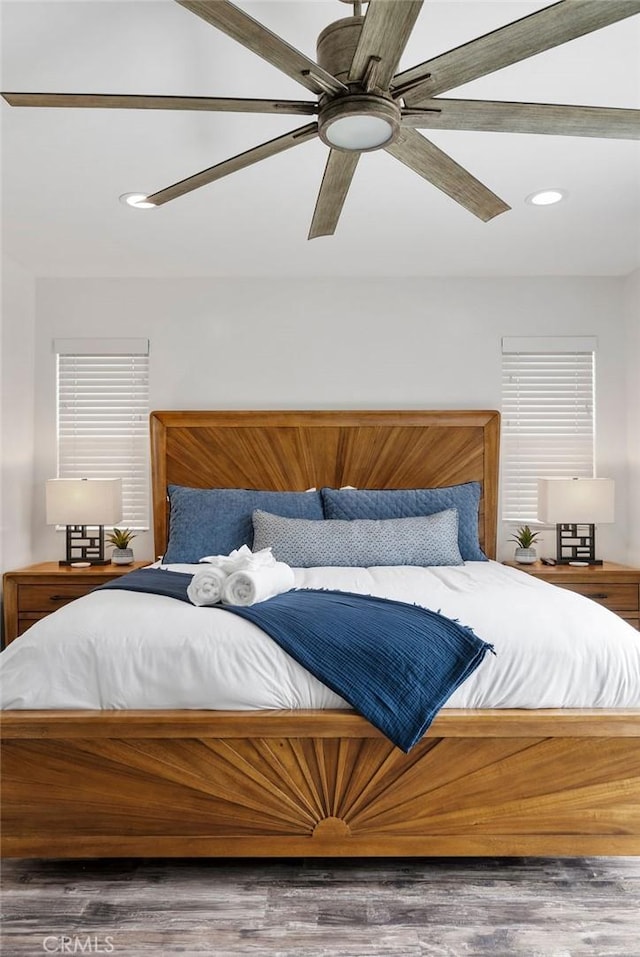 bedroom with recessed lighting, a ceiling fan, and wood finished floors