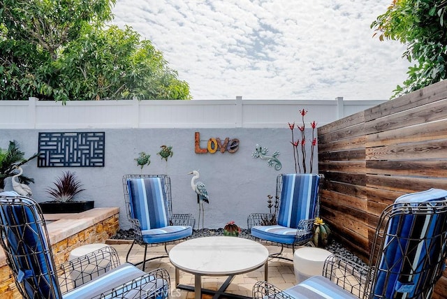 view of patio with fence
