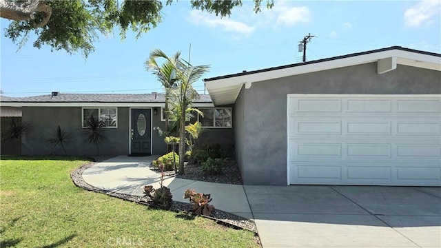 2108 Raleigh Ave, Costa Mesa, CA 92627 - view of front facade featuring stucco siding, driveway, a front yard, and a garage