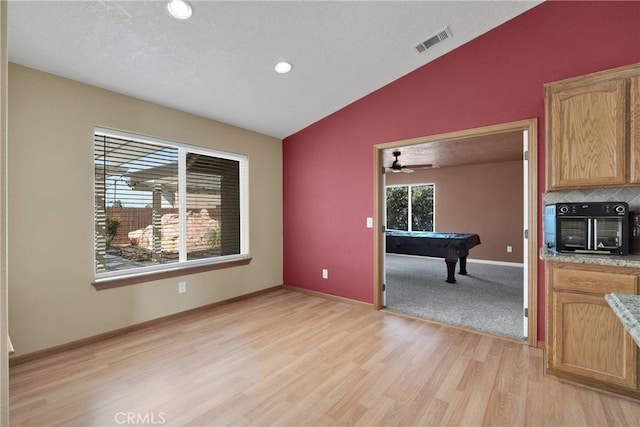 19501 Kinai Rd, Apple Valley, CA 92307 - interior space featuring pool table, a toaster, light wood-style flooring, lofted ceiling, and visible vents