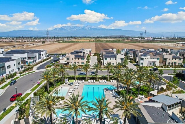 bird's eye view featuring a residential view and a mountain view