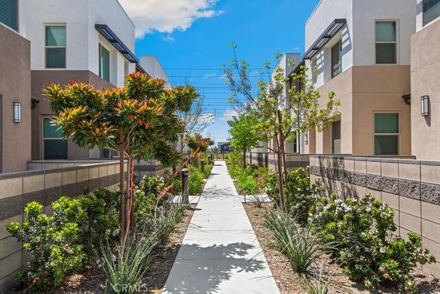 view of property's community featuring fence