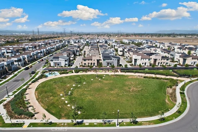 aerial view featuring a mountain view and a residential view