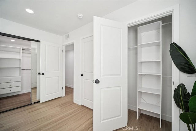 closet featuring visible vents