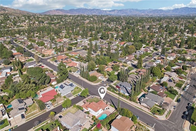 bird's eye view featuring a residential view and a mountain view