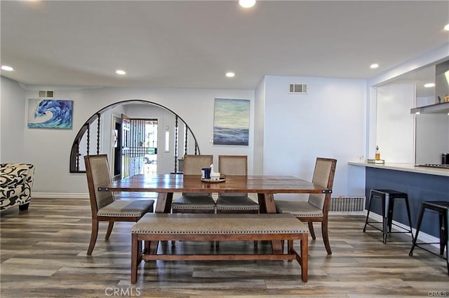 8037 Cactus Cir, Buena Park, CA 90620 - dining area featuring wood finished floors, recessed lighting, baseboards, and arched walkways