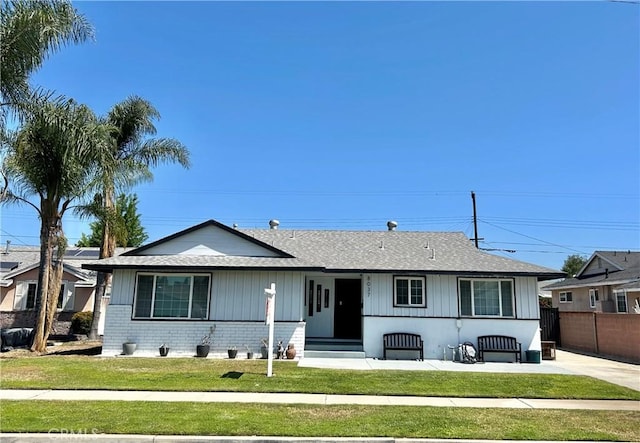 8037 Cactus Cir, Buena Park, CA 90620 - single story home with roof with shingles and brick siding