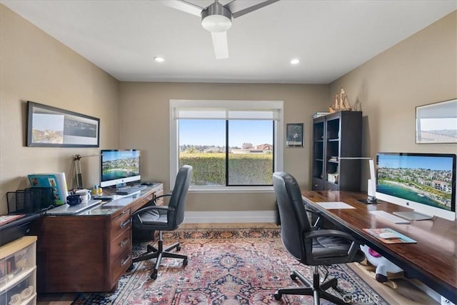 home office with recessed lighting and baseboards