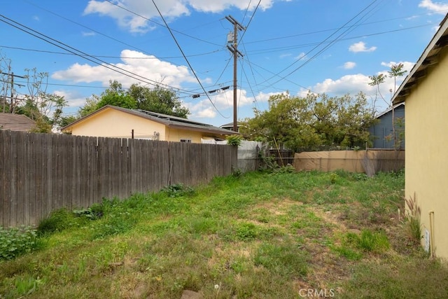 view of yard featuring fence