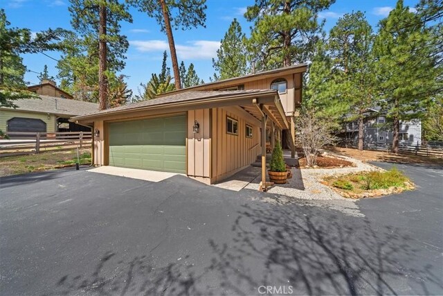 garage featuring fence