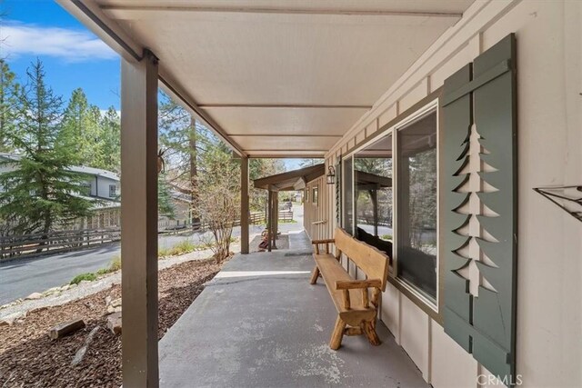 view of patio featuring fence