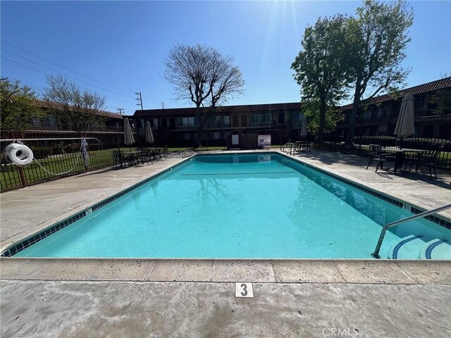 1400 W Warner Ave Unit 60, Santa Ana, CA 92704 - pool featuring fence and a patio area
