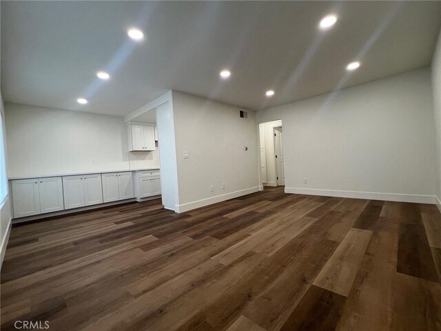 1400 W Warner Ave Unit 60, Santa Ana, CA 92704 - interior space with baseboards, recessed lighting, and dark wood-style flooring