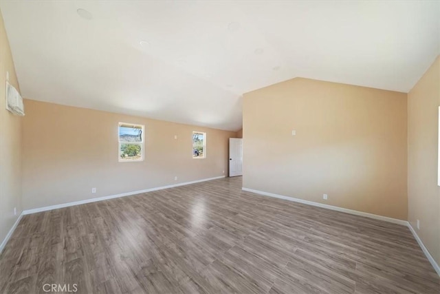 63285 Pinyon Dr, Mountain Center, CA 92561 - unfurnished living room featuring baseboards, wood finished floors, and lofted ceiling