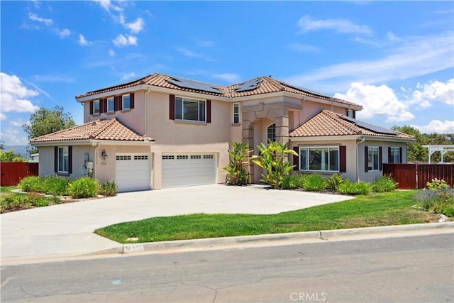 1732 Gamble Ln, Escondido, CA 92029 - mediterranean / spanish home with a tiled roof, solar panels, and stucco siding