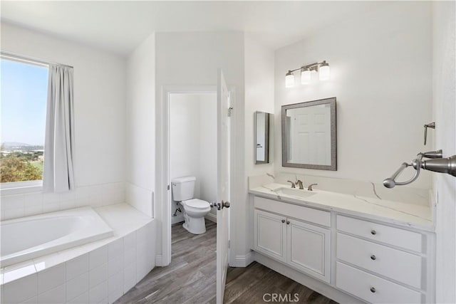 1732 Gamble Ln, Escondido, CA 92029 - full bath with a garden tub, healthy amount of natural light, vanity, and wood finished floors