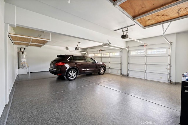 1732 Gamble Ln, Escondido, CA 92029 - garage featuring water heater and a garage door opener