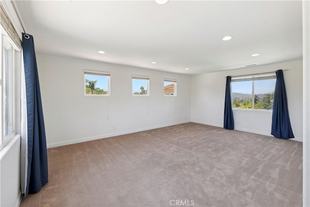 1732 Gamble Ln, Escondido, CA 92029 - empty room with light carpet, healthy amount of natural light, and recessed lighting