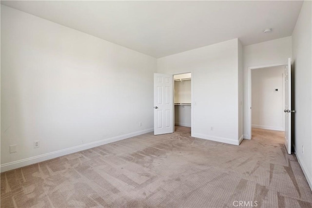 1732 Gamble Ln, Escondido, CA 92029 - unfurnished bedroom featuring light carpet, a spacious closet, and a closet