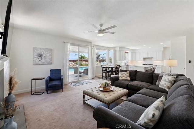 1732 Gamble Ln, Escondido, CA 92029 - living room with a ceiling fan and light colored carpet