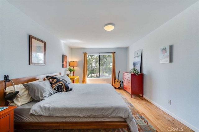 1940 N Highland Ave Unit 69, Los Angeles, CA 90068 - bedroom with light wood finished floors and baseboards