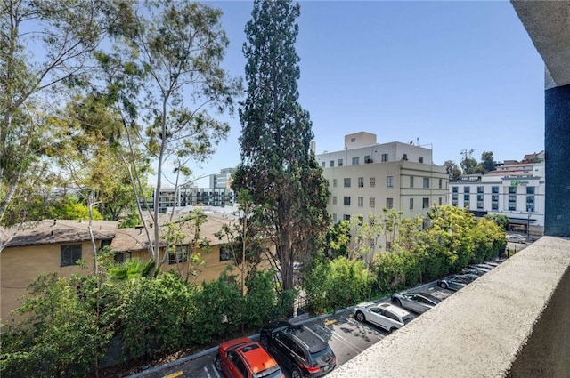 view of property with uncovered parking